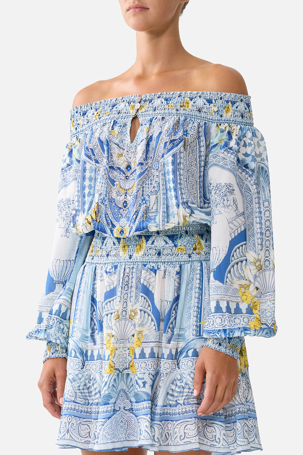 The CAMILLA LONG SLEEVE TIERED SHORT DRESS MAGIC OF THE MERCADO in our MAGIC OF THE MERCADO print.
