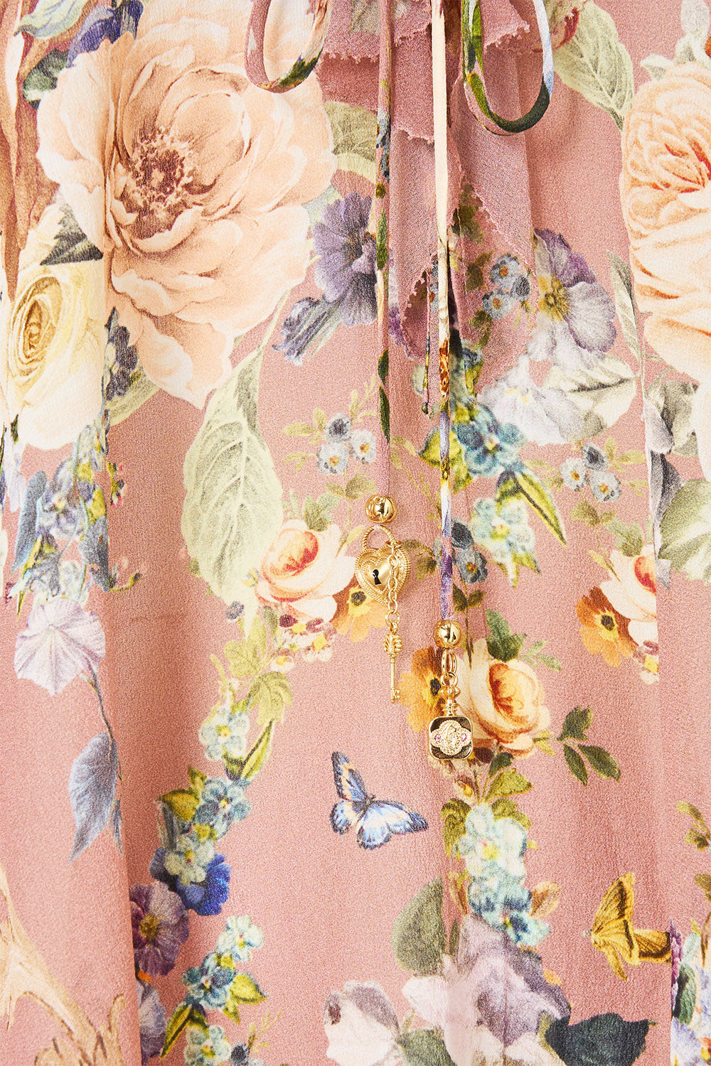 The CAMILLA LACE UP V NECK BLOUSE WITH CASCADE RUFFLES CHAMBER OF BLOOMS