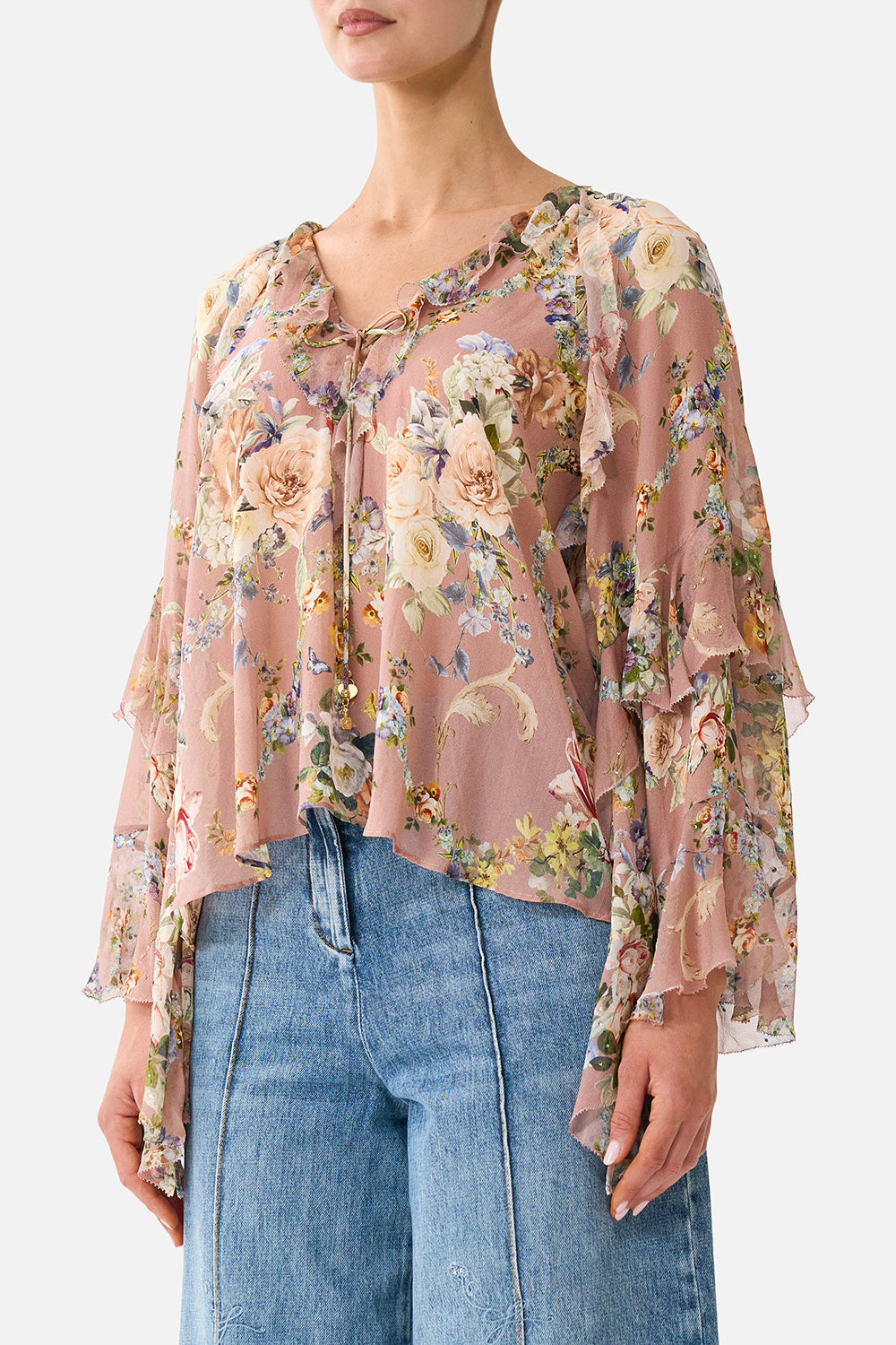 The CAMILLA LACE UP V NECK BLOUSE WITH CASCADE RUFFLES CHAMBER OF BLOOMS