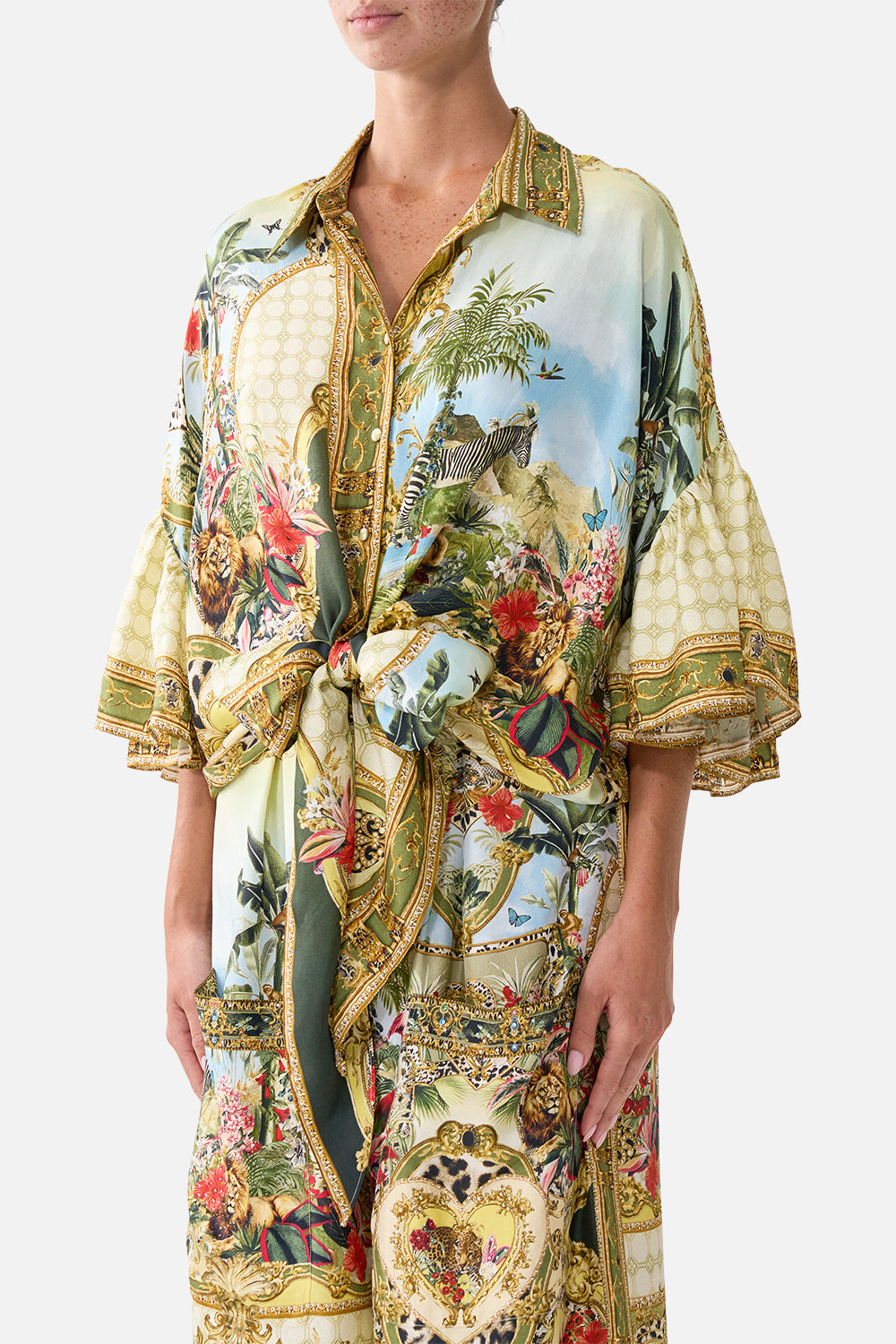 The CAMILLA Tie Front Shirt with Sleeve Frill in our Wanderlust Empire print, detail view on model.