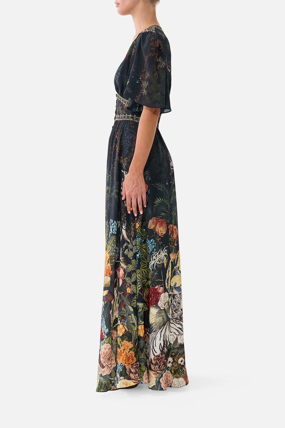 The CAMILLA Shaped Waistband Dress with Flutter Sleeves in our Palace Zoology print, side view on model.