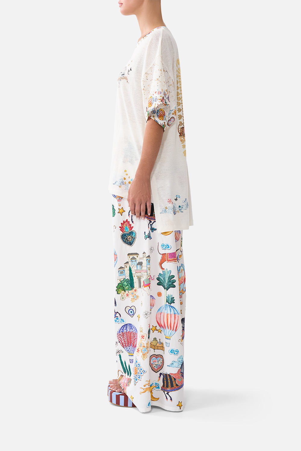 The CAMILLA WAISTED DRESS WITH HEM RUFFLE MEET ME IN MALLORCA in our MEET ME IN MALLORCA print.
