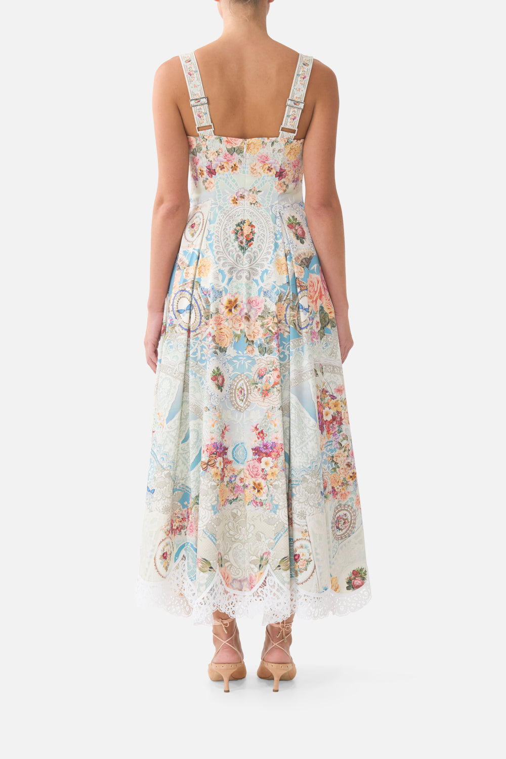 The CAMILLA WAISTBAND DRESS WITH TIE DETAIL MAGIC OF THE MERCADO in our MAGIC OF THE MERCADO print.