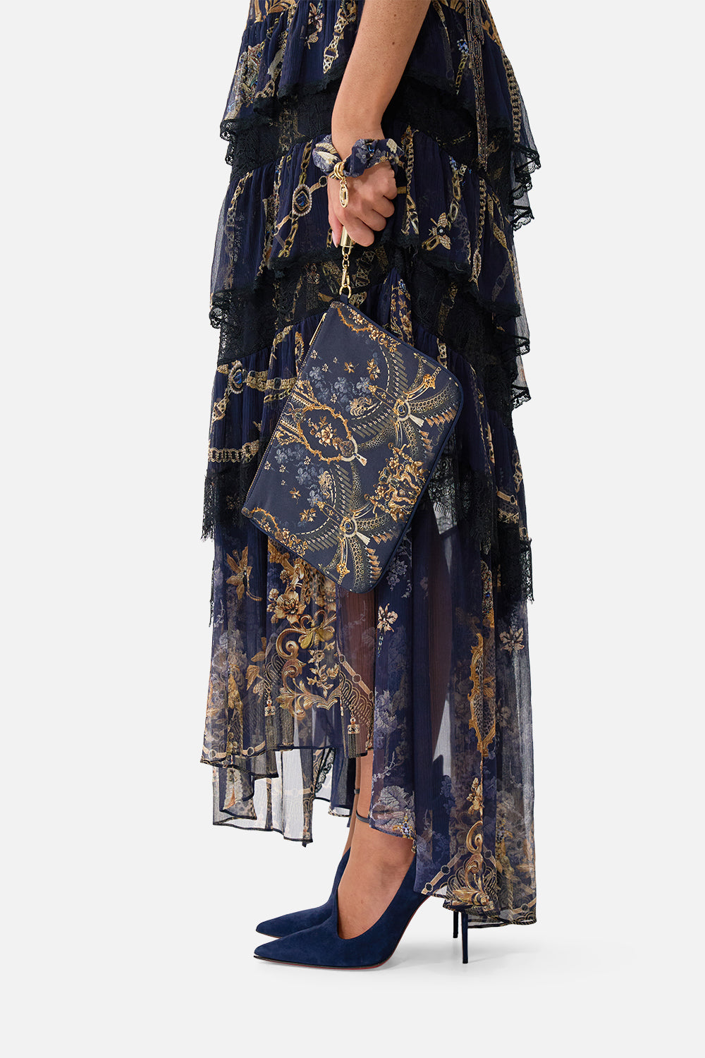 The CAMILLA Scarf Clutch in our Cloaked in Baroque print, side view on model.