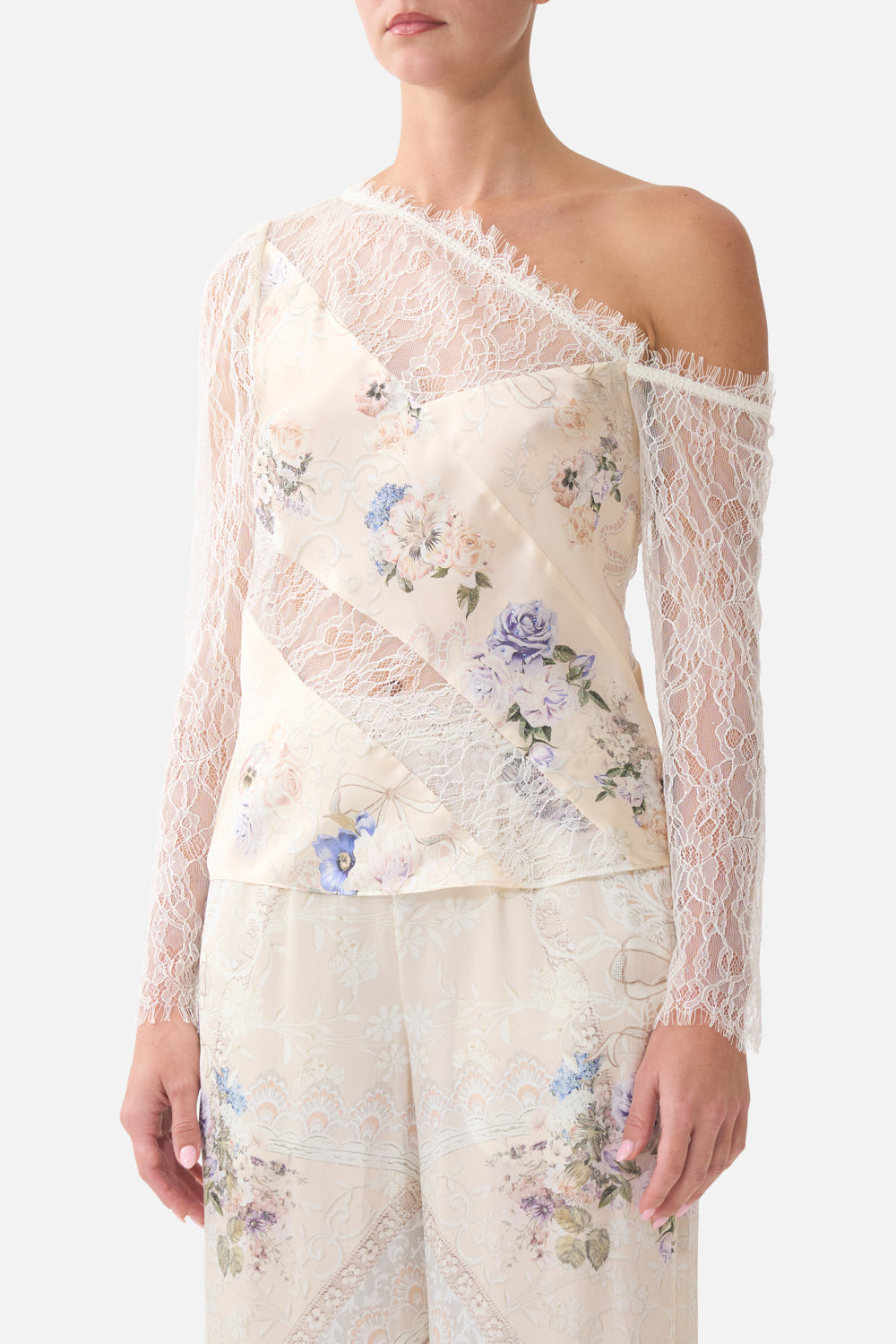 The CAMILLA RELAXED TRACK PANT WITH RIBBED HEM NIGHT GARDEN in our  print.