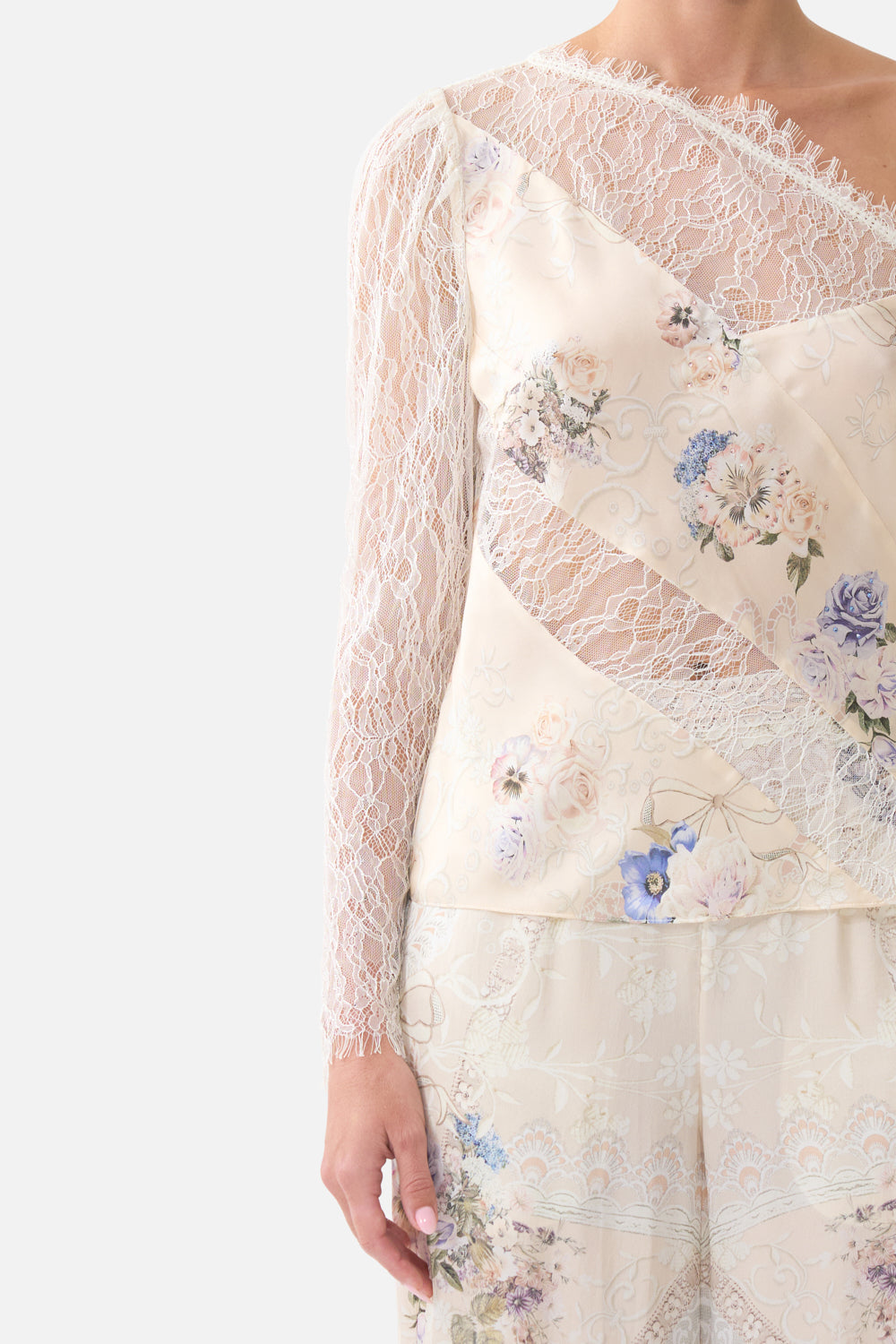 The CAMILLA RELAXED TRACK PANT WITH RIBBED HEM NIGHT GARDEN in our  print.