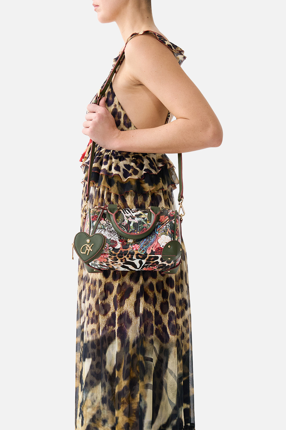 The CAMILLA Barrel Bag with Leather Trims in our Leotigra Land print, side view on model.
