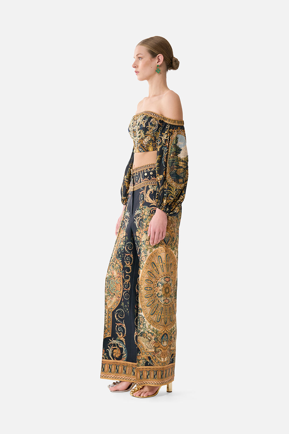 The CAMILLA FLARED JUMPSUIT WANDERLUST EMPIRE in our WANDERLUST EMPIRE print.
