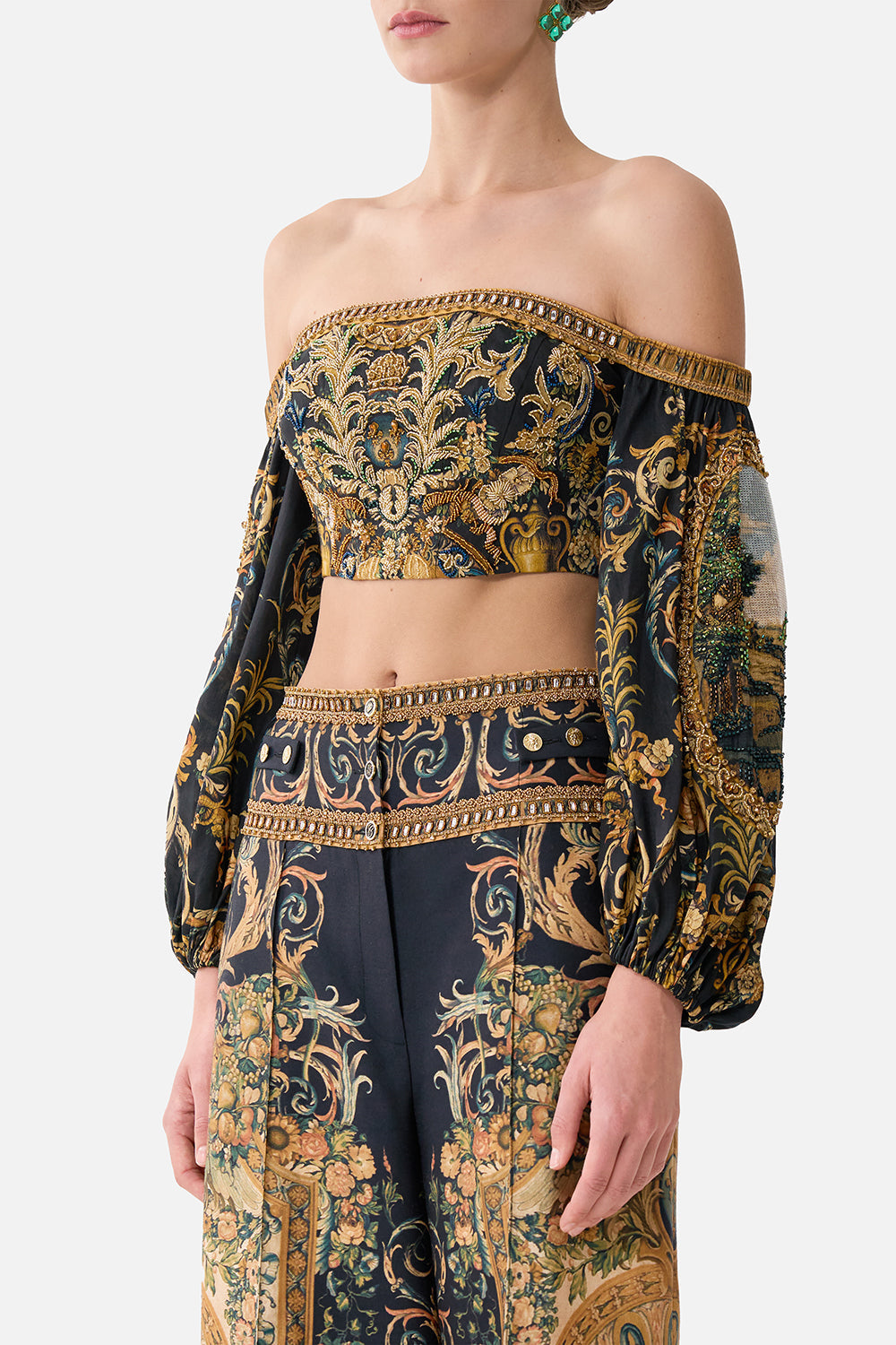The CAMILLA FLARED JUMPSUIT WANDERLUST EMPIRE in our  print.