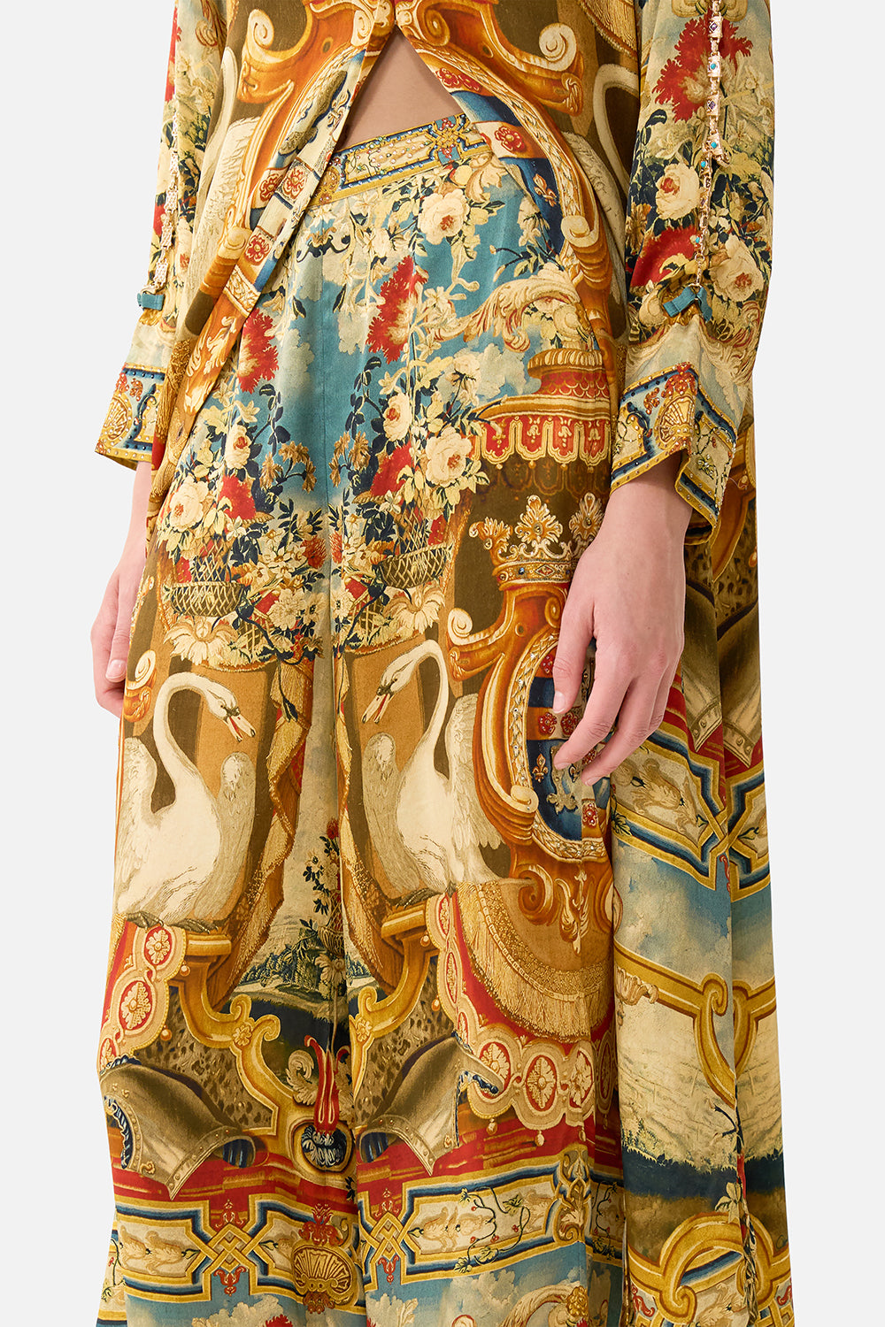The CAMILLA SHORT WAISTBAND DRESS WITH RUFFLE SLEEVE LEOPARD LIBERTINE in our  print.