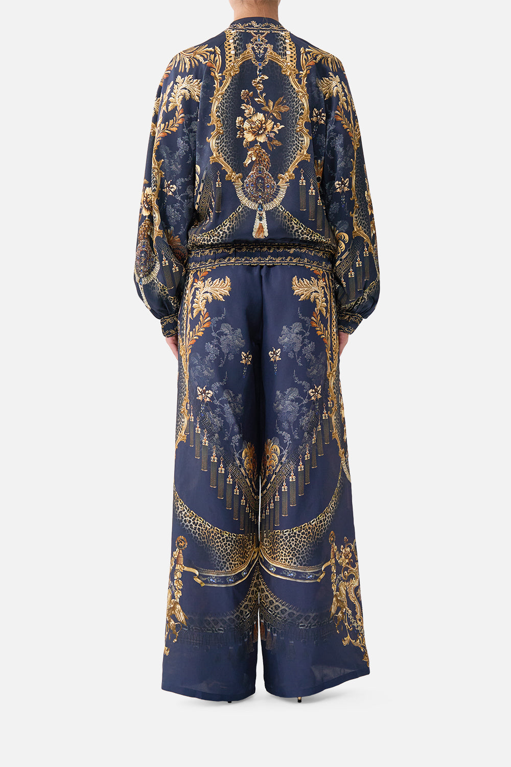 The CAMILLA Bomber Jacket with Shirred Cuff in our Cloaked in Baroque print, back view on model.