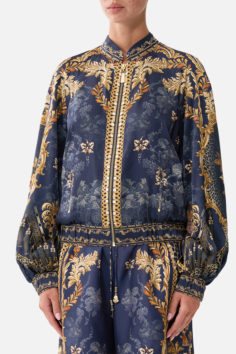 The CAMILLA Bomber Jacket with Shirred Cuff in our Cloaked in Baroque print, detail view on model.