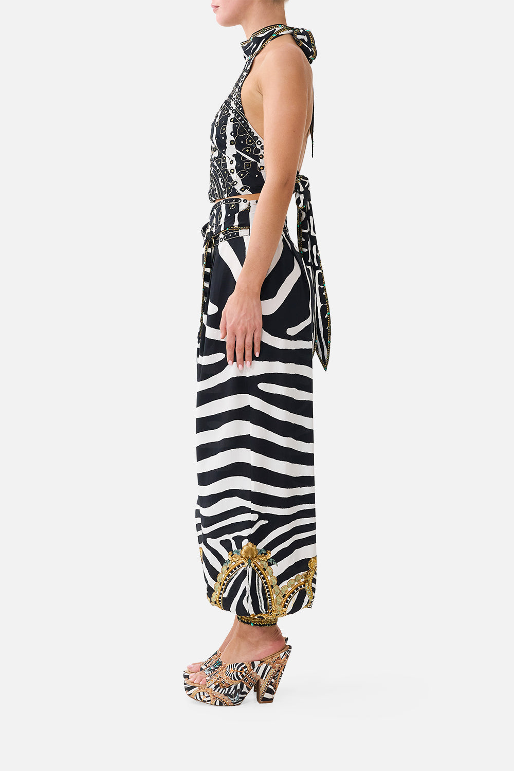 The CAMILLA Halter Tie Back Top in our Zig Zag Zoo print, side view on model.