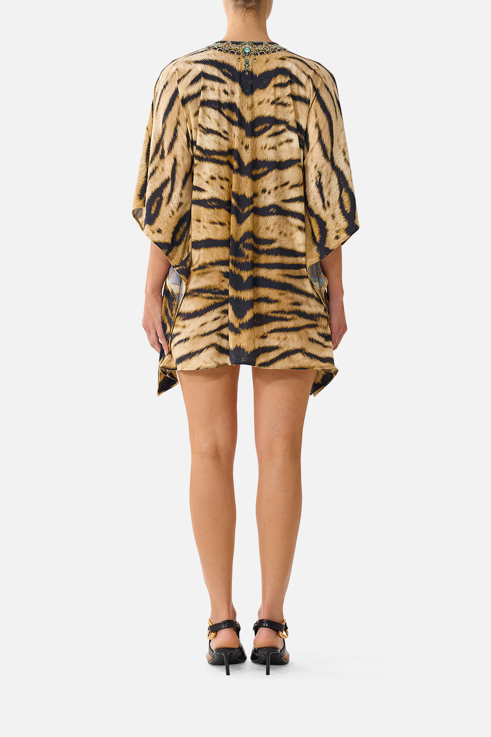 The CAMILLA Short V-Neck Kaftan W/ Ring Front Trim in Print A Wink to the Wild. Model View