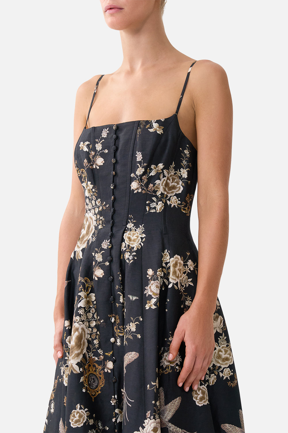 The CAMILLA SHORT V NECK KAFTAN W RING FRONT TRIM MAGIC OF THE MERCADO in our MAGIC OF THE MERCADO print.