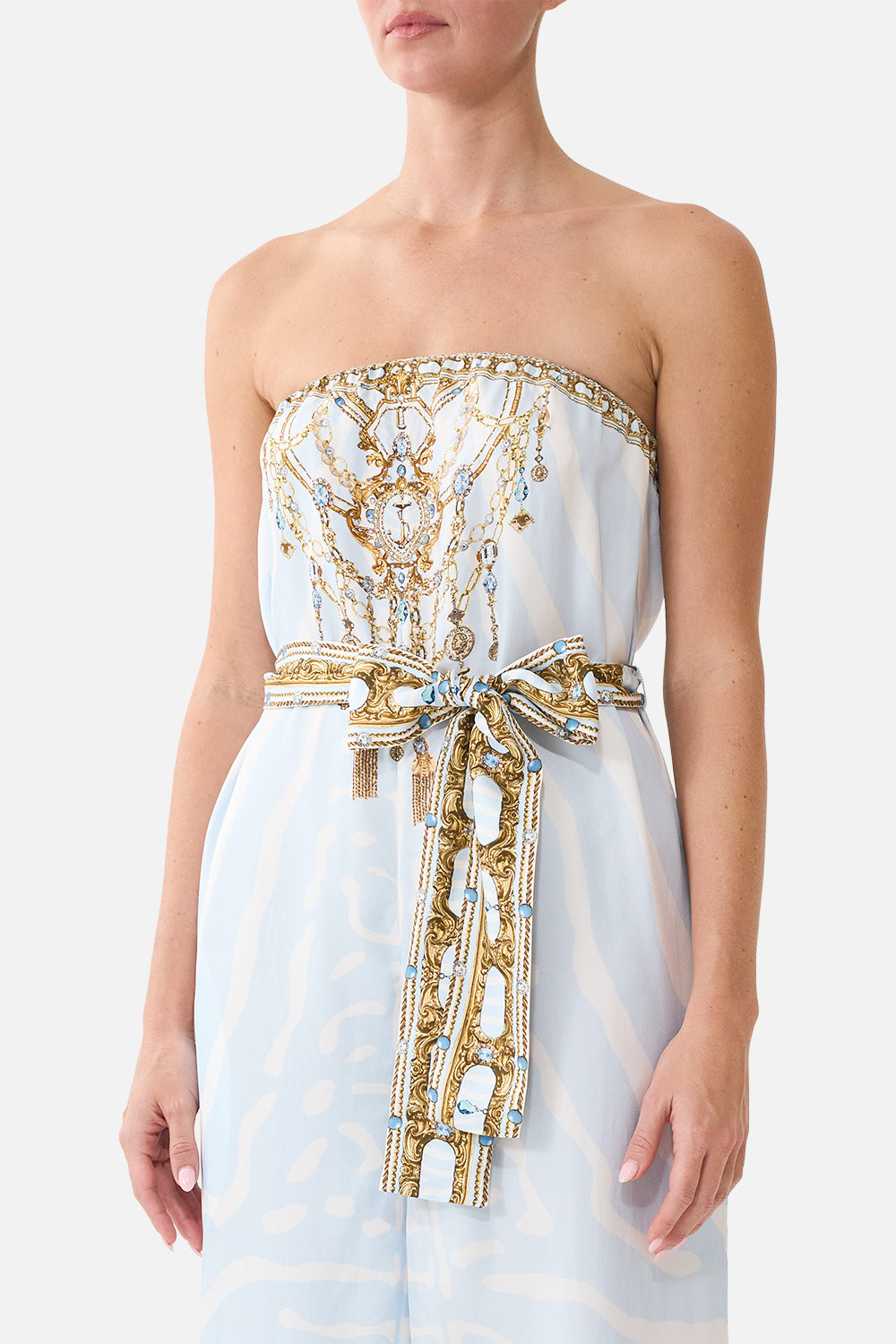 The CAMILLA Tie Waist Strapless Jumpsuit in our Spirit of Stripes print, detail view on model.