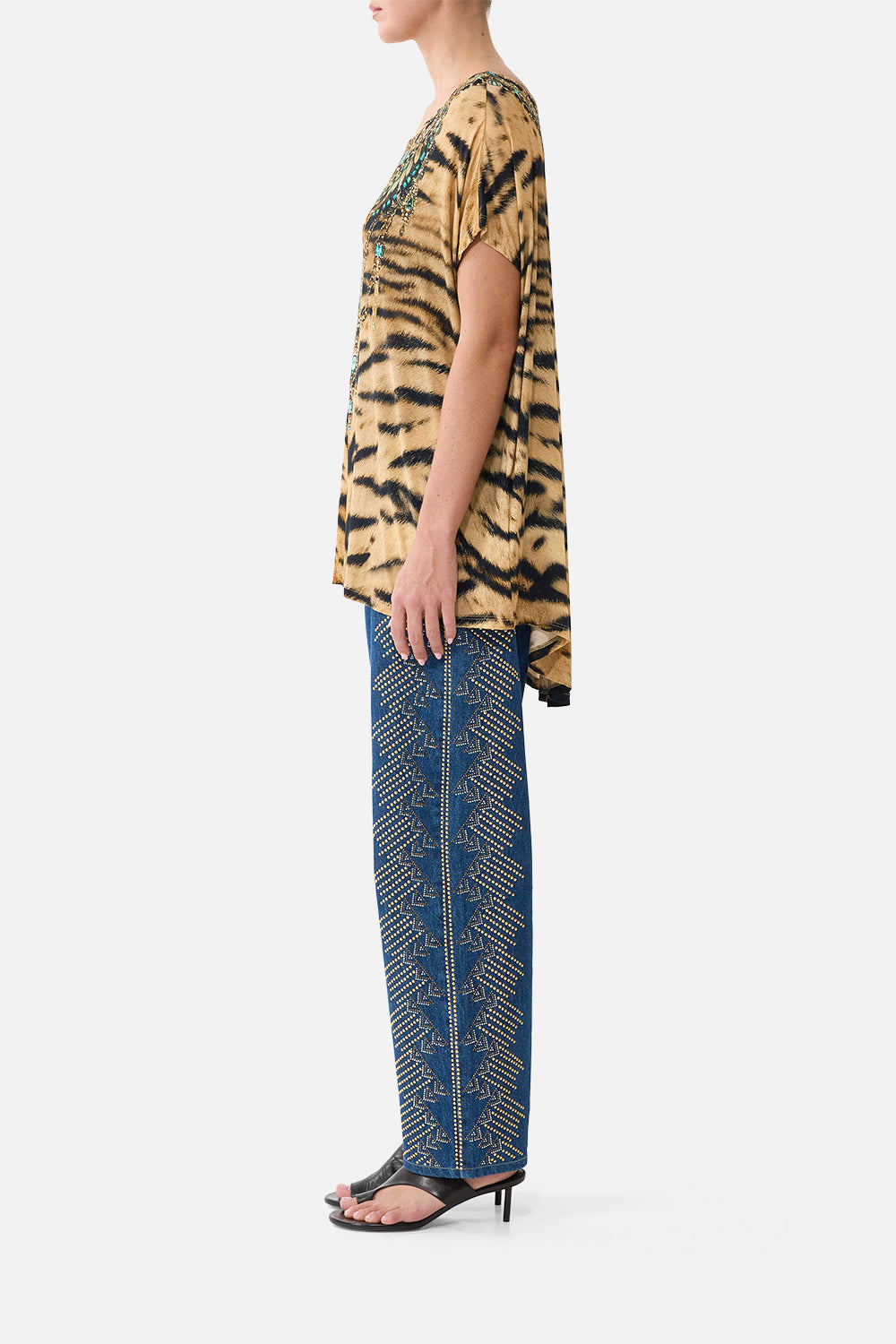 The CAMILLA Loose Fit Tee in our A Wink to the Wild print, side view on model.