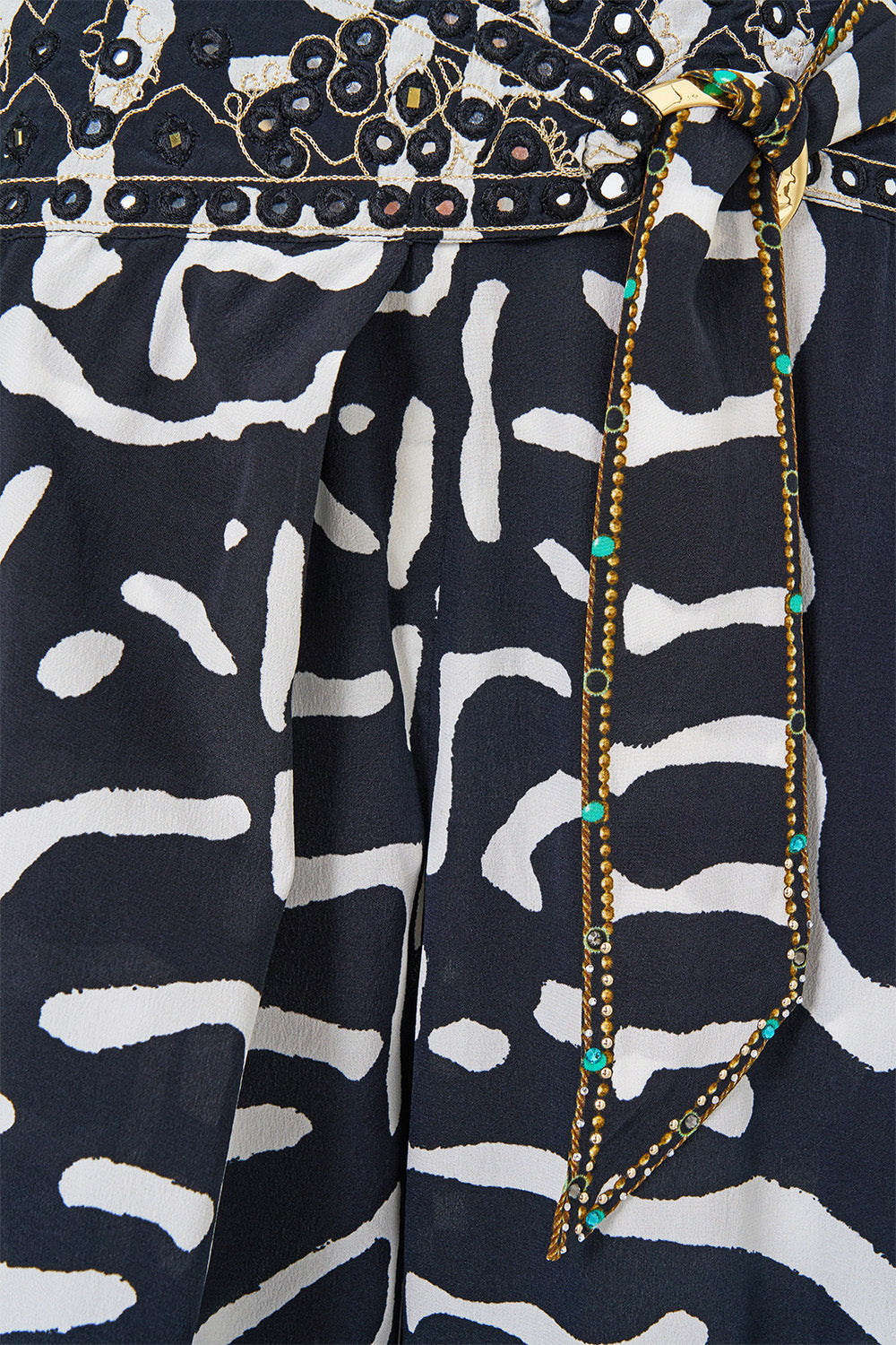 The CAMILLA Asymmetrical Belted Pant in our Zig Zag Zoo print, fabric detail.