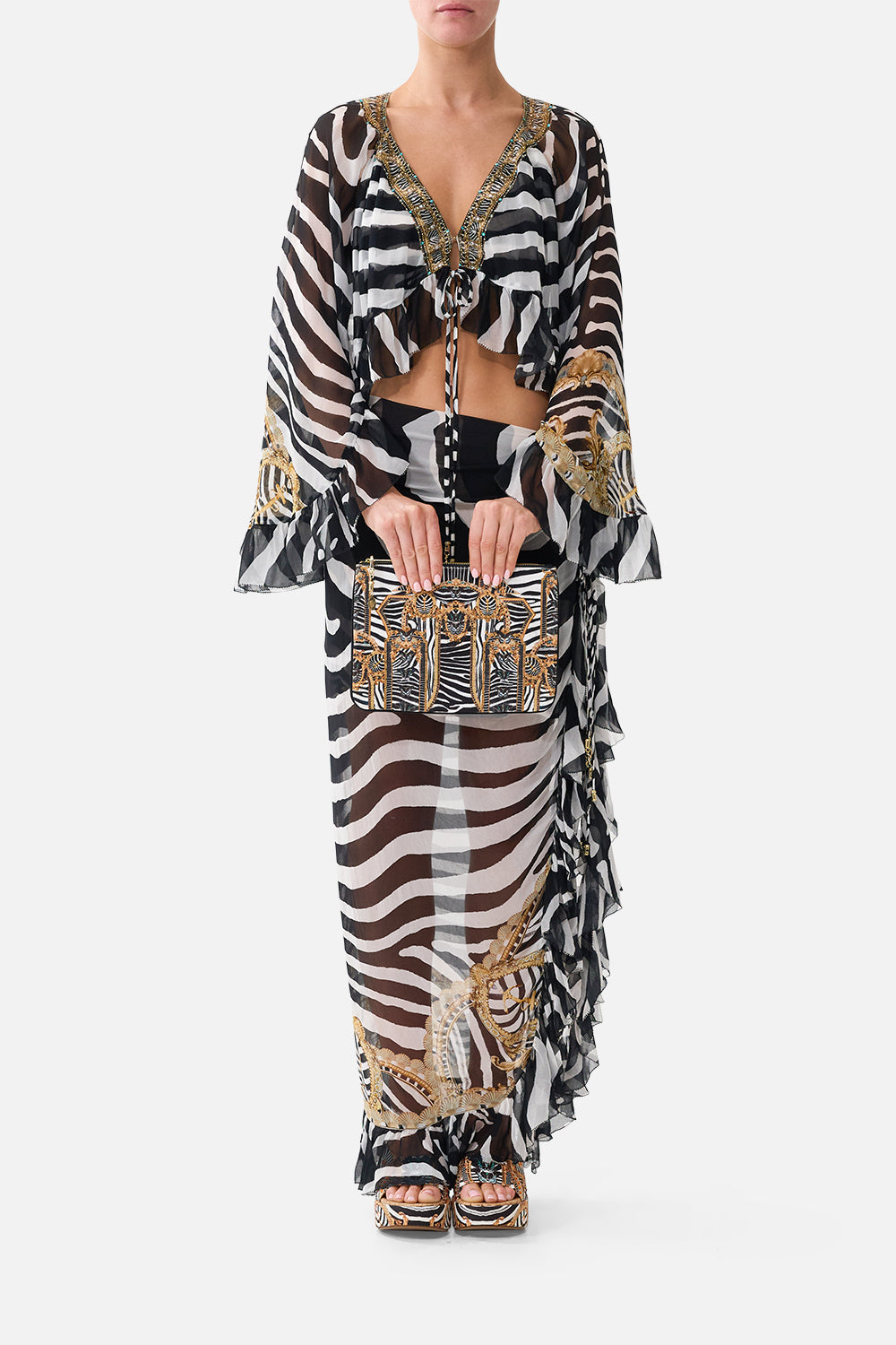 The CAMILLA Small Canvas Clutch in Print Zig Zag Zoo. Model View