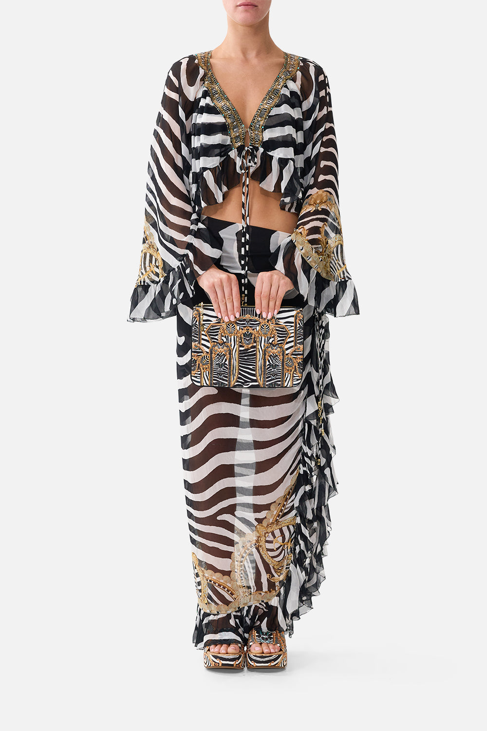The CAMILLA Small Canvas Clutch in our Zig Zag Zoo print, front view on model.