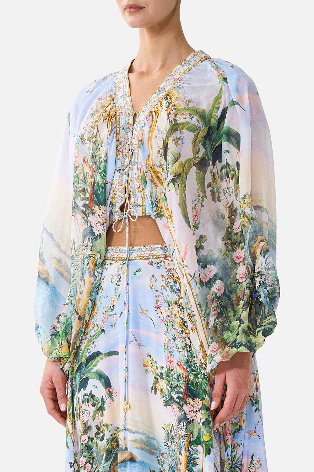The CAMILLA Lace Up Front Blouson Sleeve Blouse Sisi Society in our Sisi Society print.