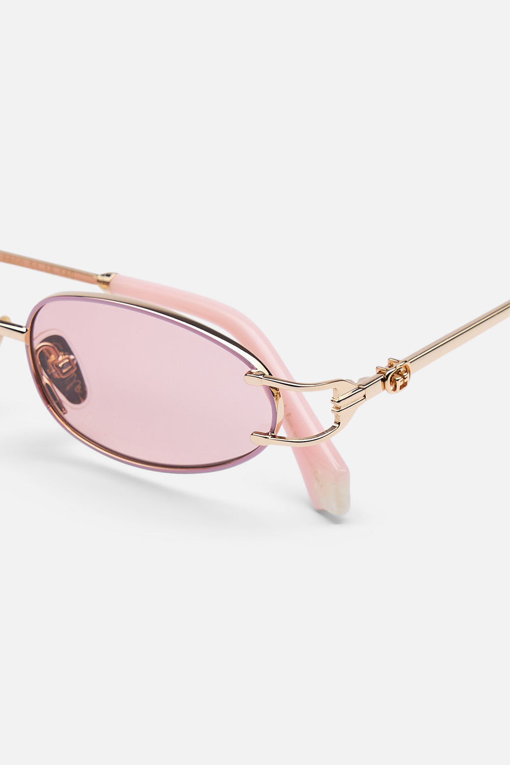 The CAMILLA bound for bohemia sunglasses in Gold / Blush.