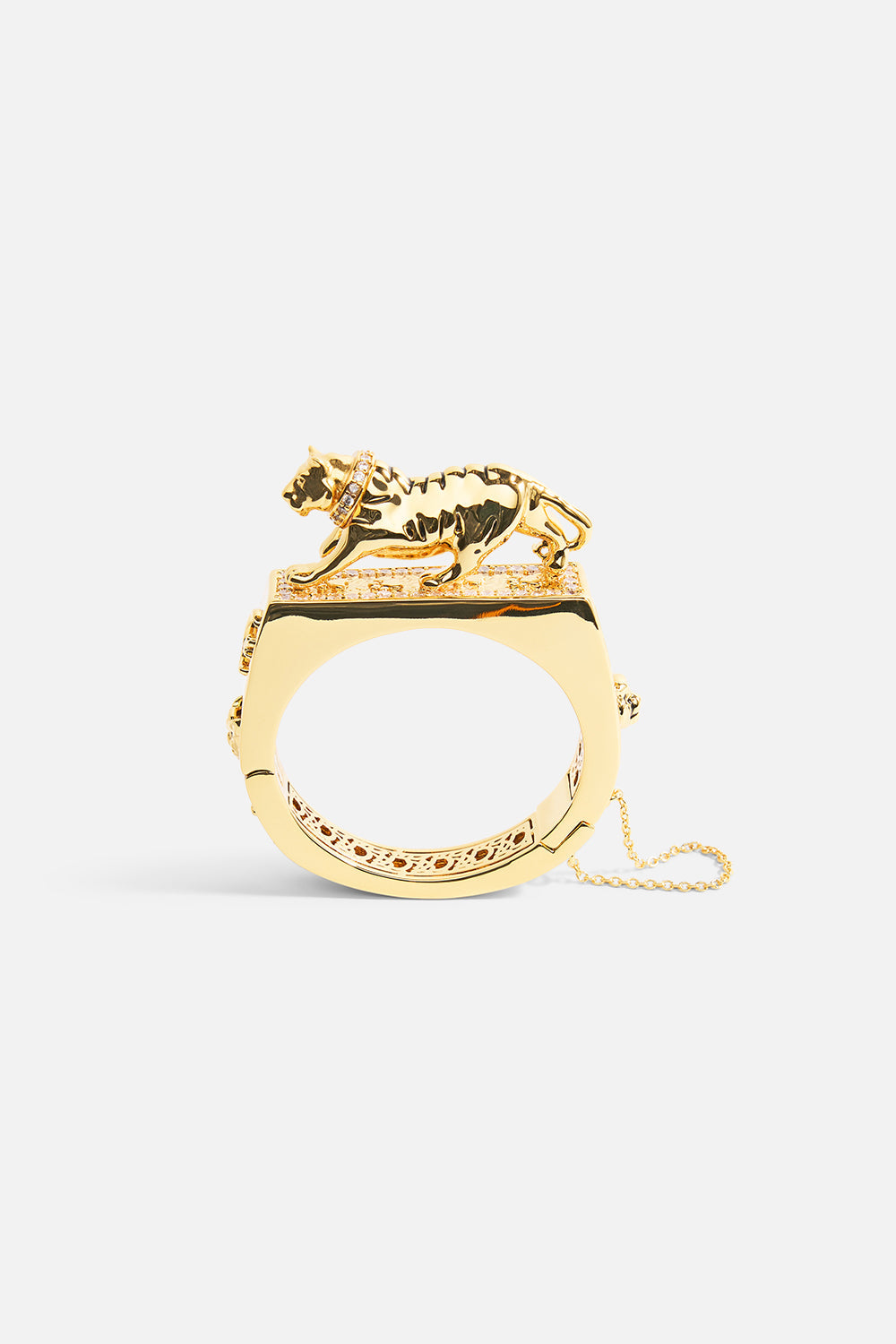 The CAMILLA Gilded Realms Leopard Cuff in gold.