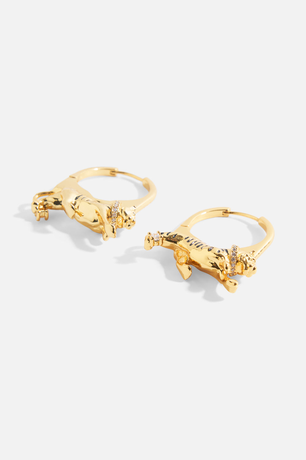 The CAMILLA Gilded Realms Leopard Earrings in gold.