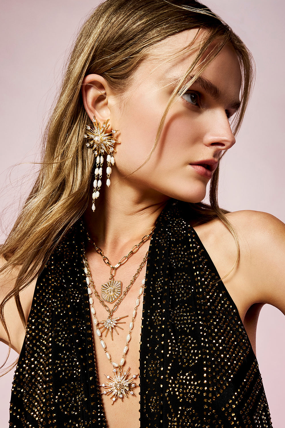 The CAMILLA Empress Of Light Star Crystal Earrings in gold.