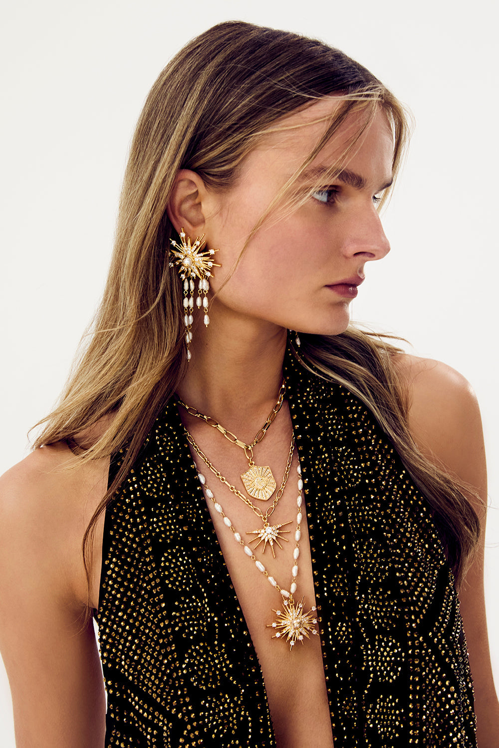 The CAMILLA Palais Aetheria Pendant Necklace in gold.
