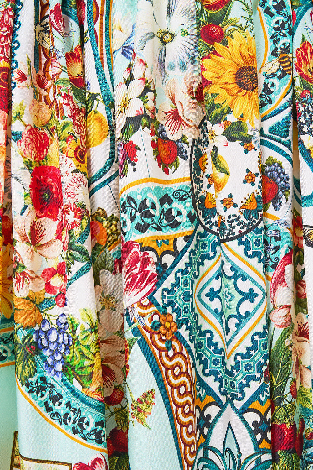 The CAMILLA KIDS HEADBAND W LARGE BOW SHE’S NO WALLFLOWER in our  print.