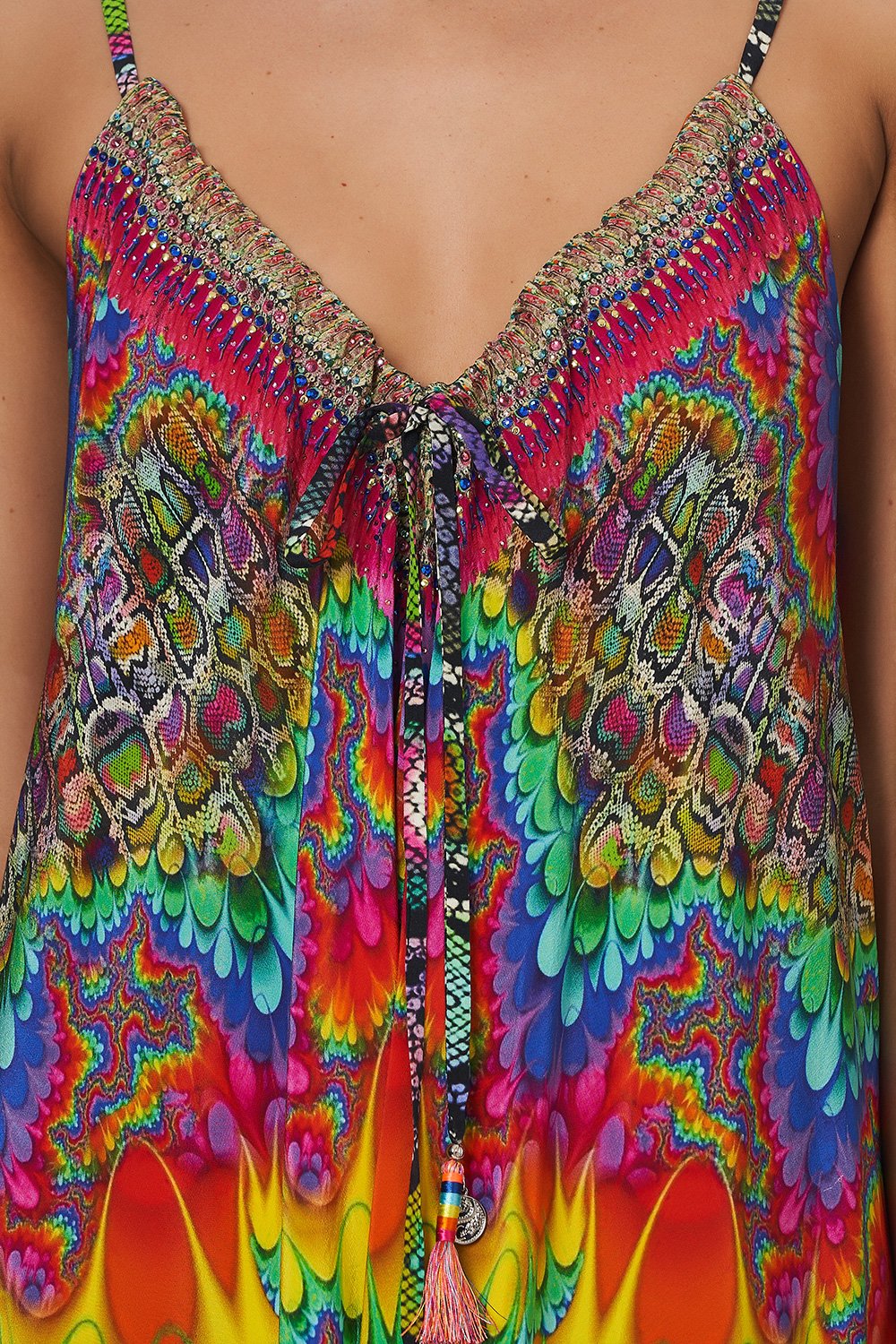 DRAPED JUMPSUIT WITH STRAPS COMING DOWN FROM COSMOS