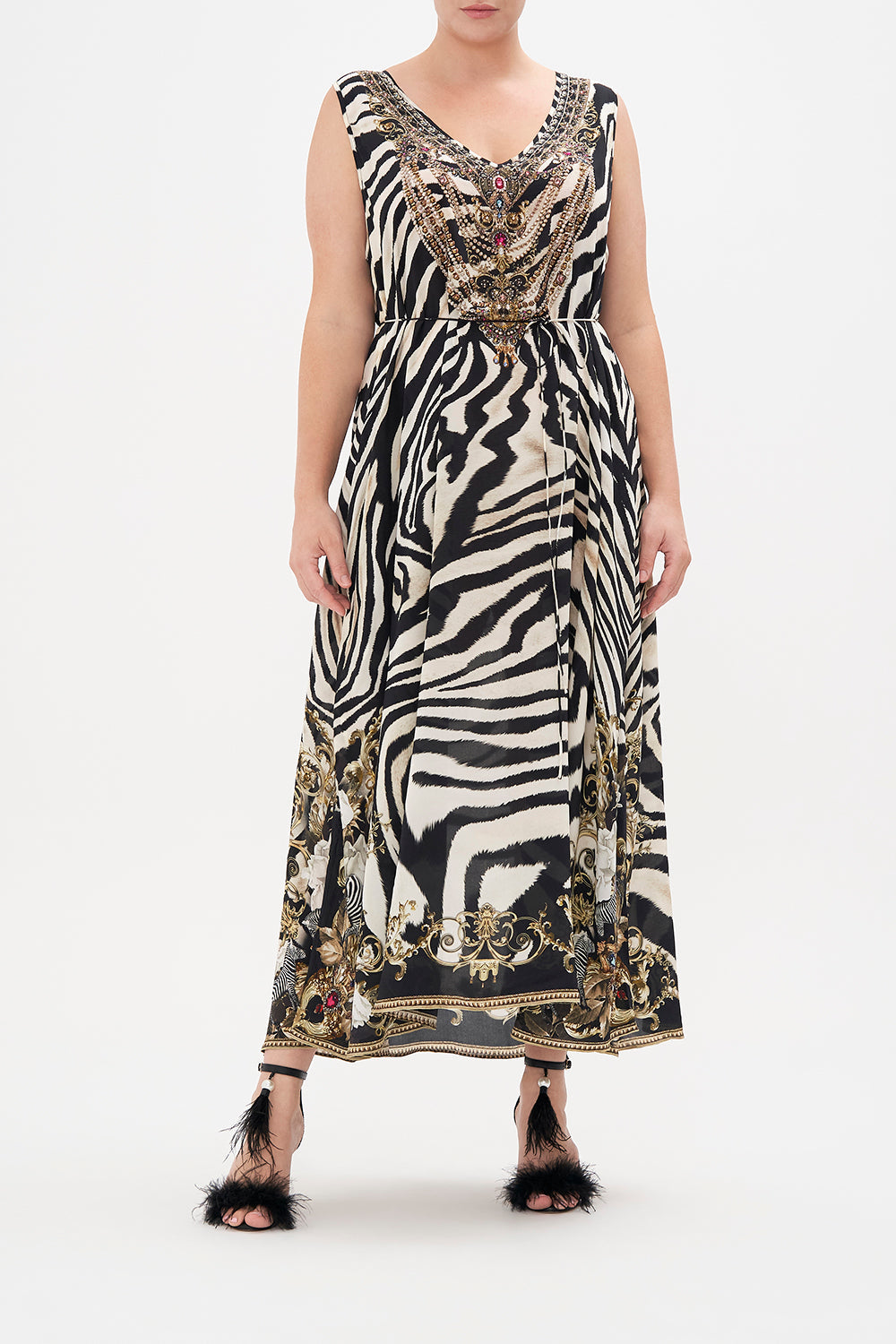 Front view of curvy model wearing CAMILLA zebra print plus size dress in Earn Your Stripes print