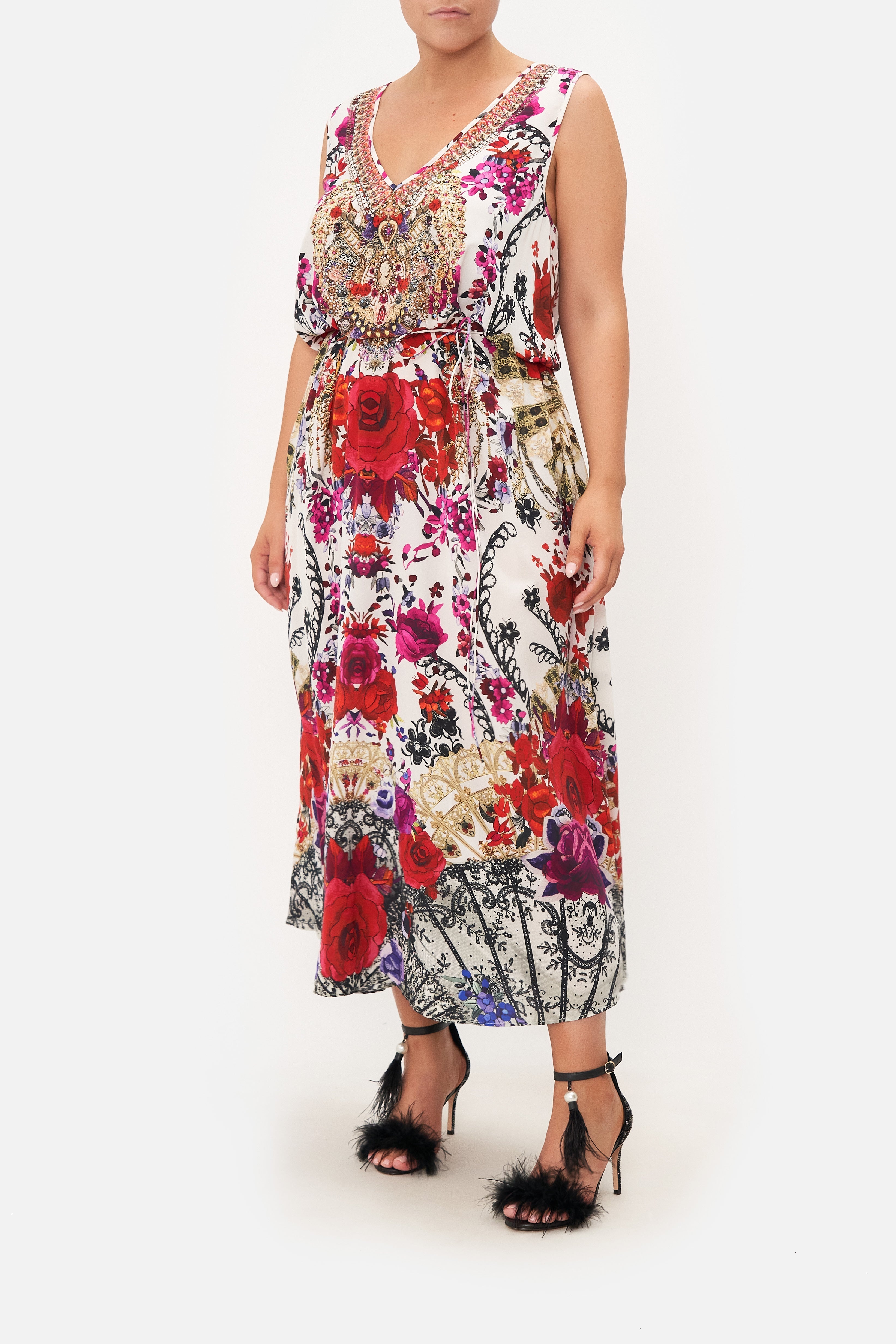 Front view of curvy model wearing CAMILLA plus size maxi dress in Reign Of Roses print