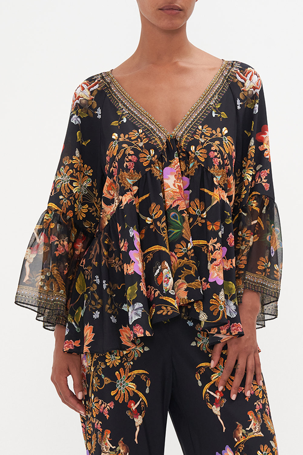 RAGLAN BLOUSE WITH SLEEVE RUFFLE TO CATCH A SPIDER